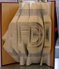 Buchskulptur &raquo;FDI&laquo;